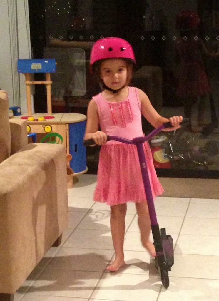 Growing up so fast - she loves to scooter to school! 